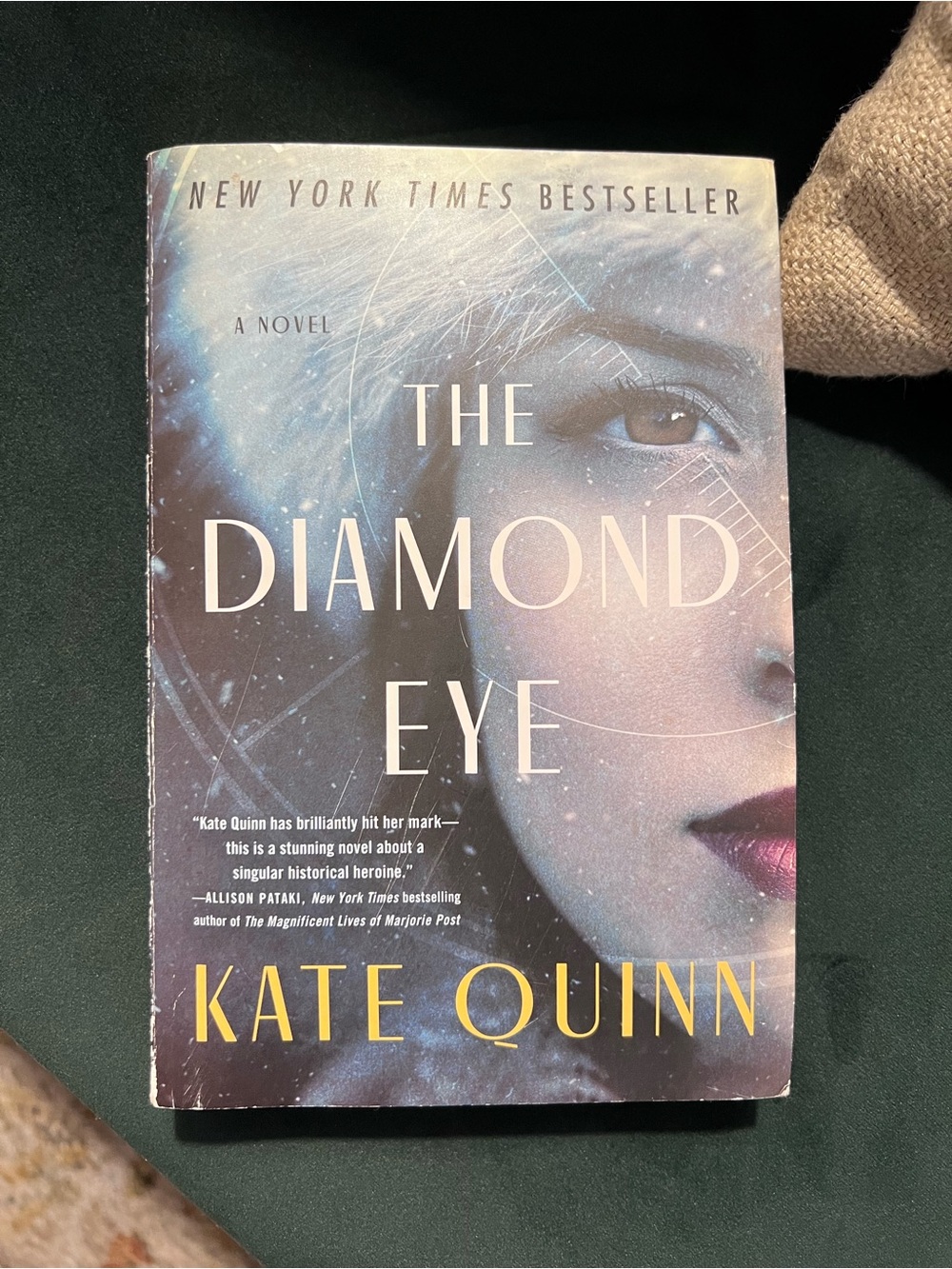 kate quinn The Diamond Eye paperback with blue-gray cover and yellow title text